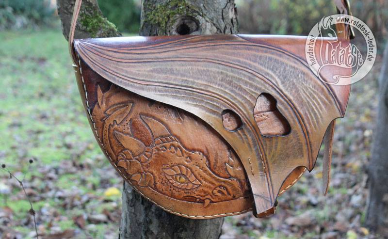 dragon bag with leather carving